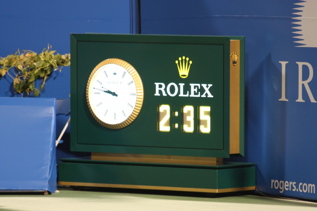 A picture of the clock, reading 2:35, after Vasek Pospisil's win over A. Seppi on Aug 6th, 2012.